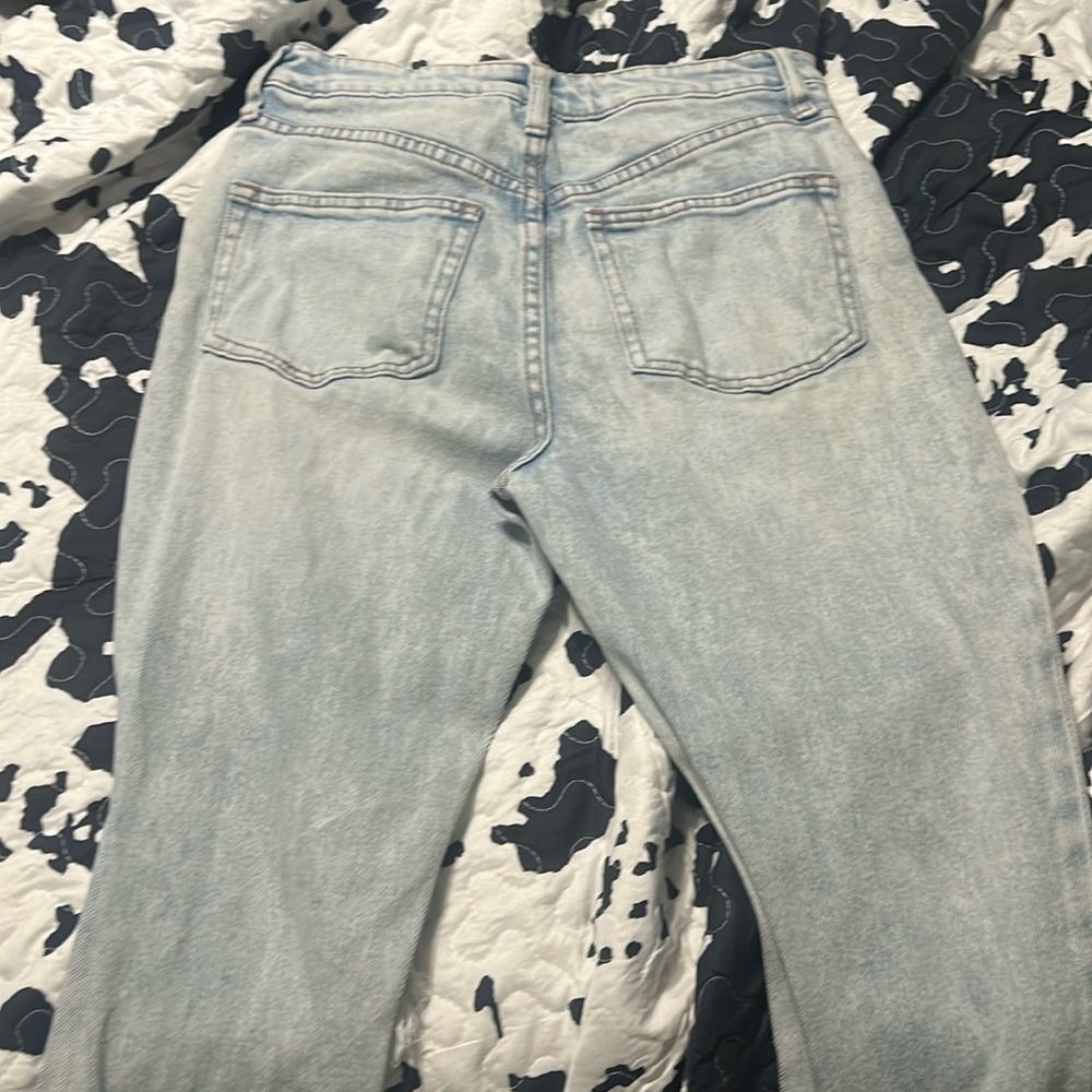 Worn washed jeans